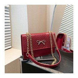 Bow chain shoulder bag