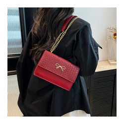 Bow chain shoulder bag